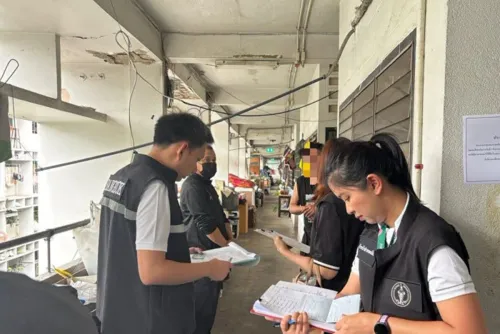 Bangkok finds more houses crowded with 'pink card' holders